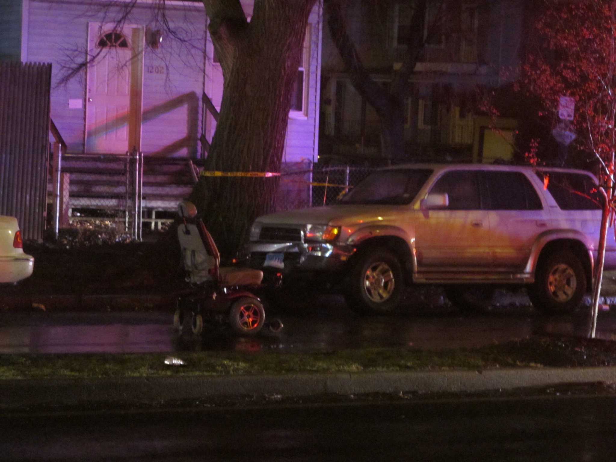 Man in electric wheelchair hit by SUV dies