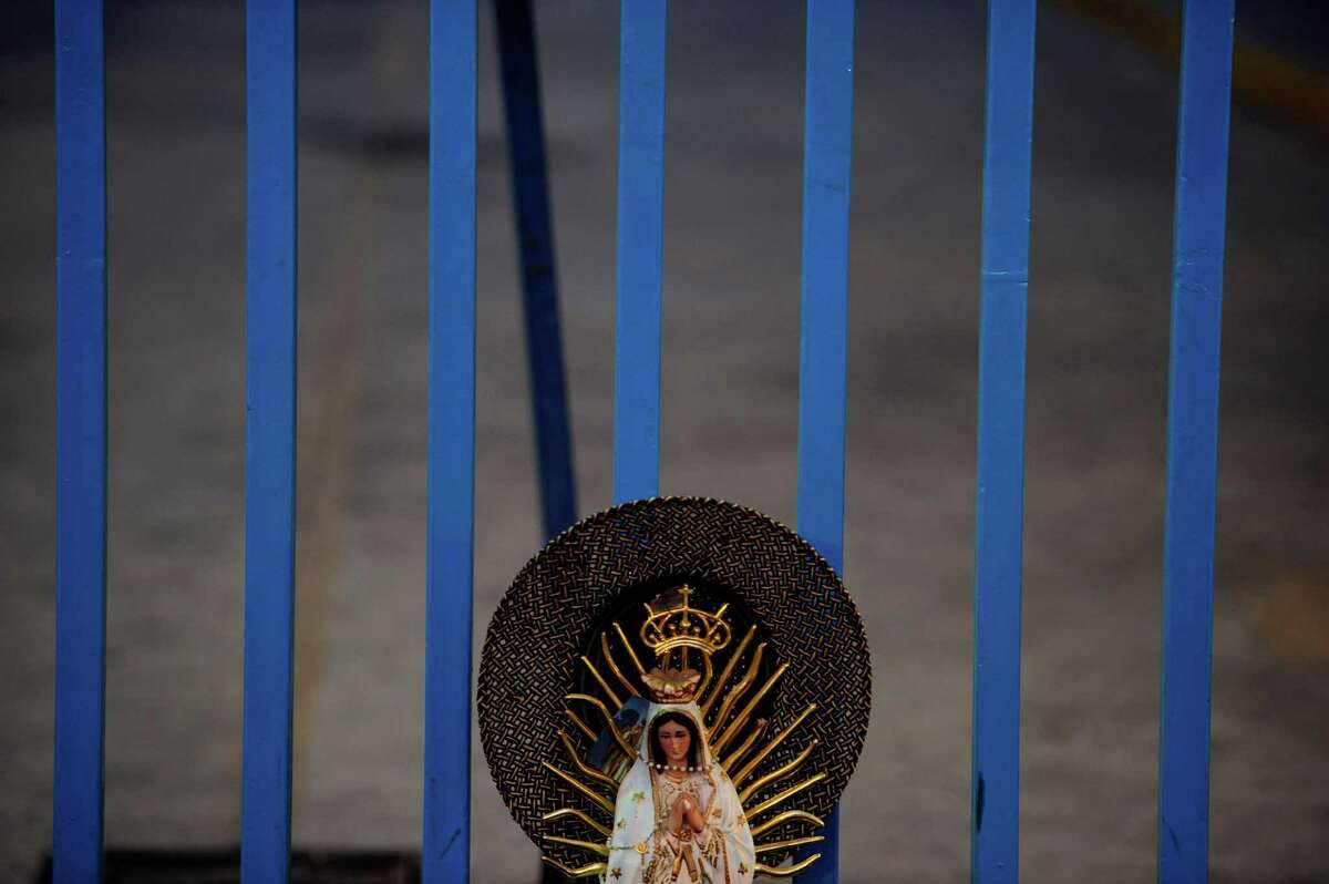 View of an image of the Guadalupe Virgin near the Basilica de Guadalupe in Mexico City on December 12, 2012. Mexicans celebrated the appearance of the Virgin of Guadalupe to Juan Diego in 1531. AFP PHOTO/Alfredo EstrellaALFREDO ESTRELLA/AFP/Getty Images
