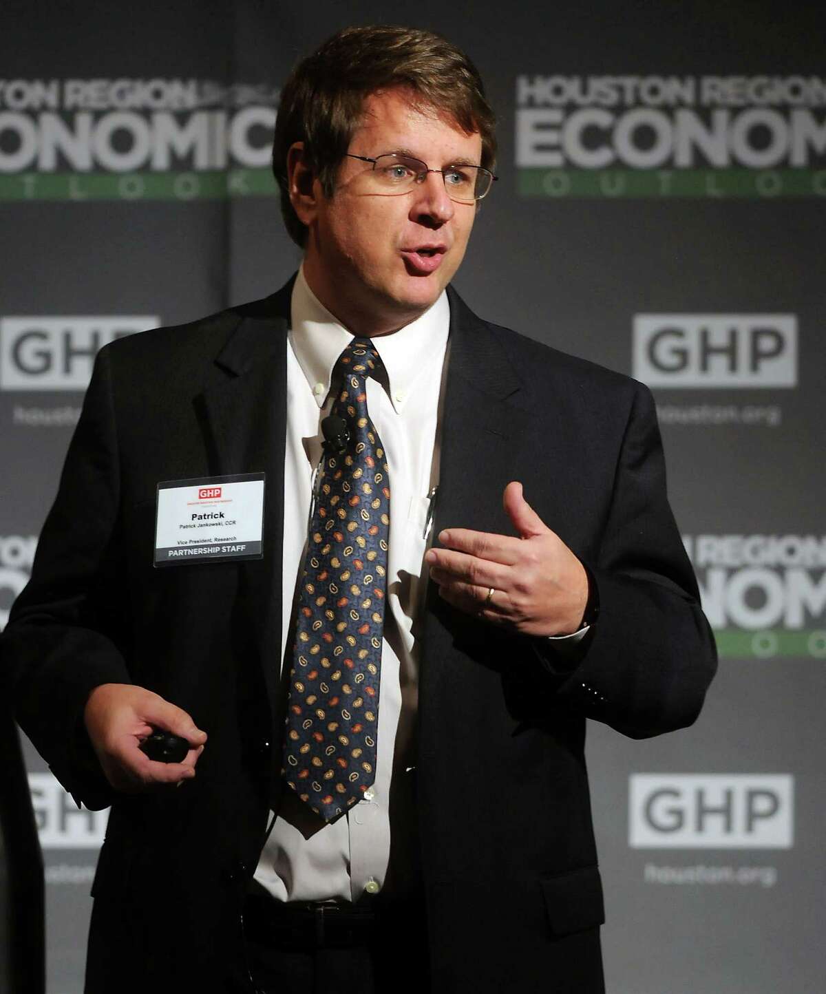 Patrick Jankowski, VP of research for the Greater Houston Partnership, speaks at their annual forecasting lunch at The Houstonian Wednesday Dec. 12, 2012.(Dave Rossman/For the Chronicle)