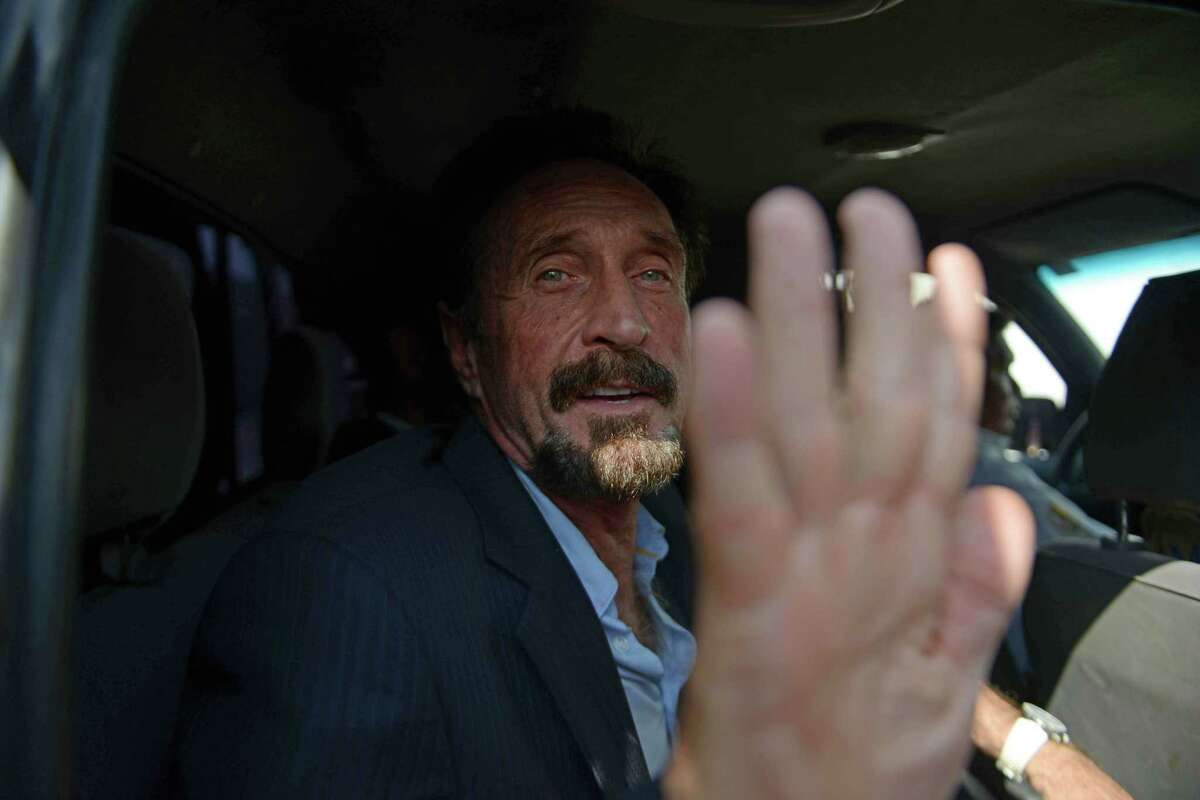 Anti-virus software pioneer John McAfee, shown arriving at Guatemala City's Aurora international airport on Wednesday, was sent back to the United States.