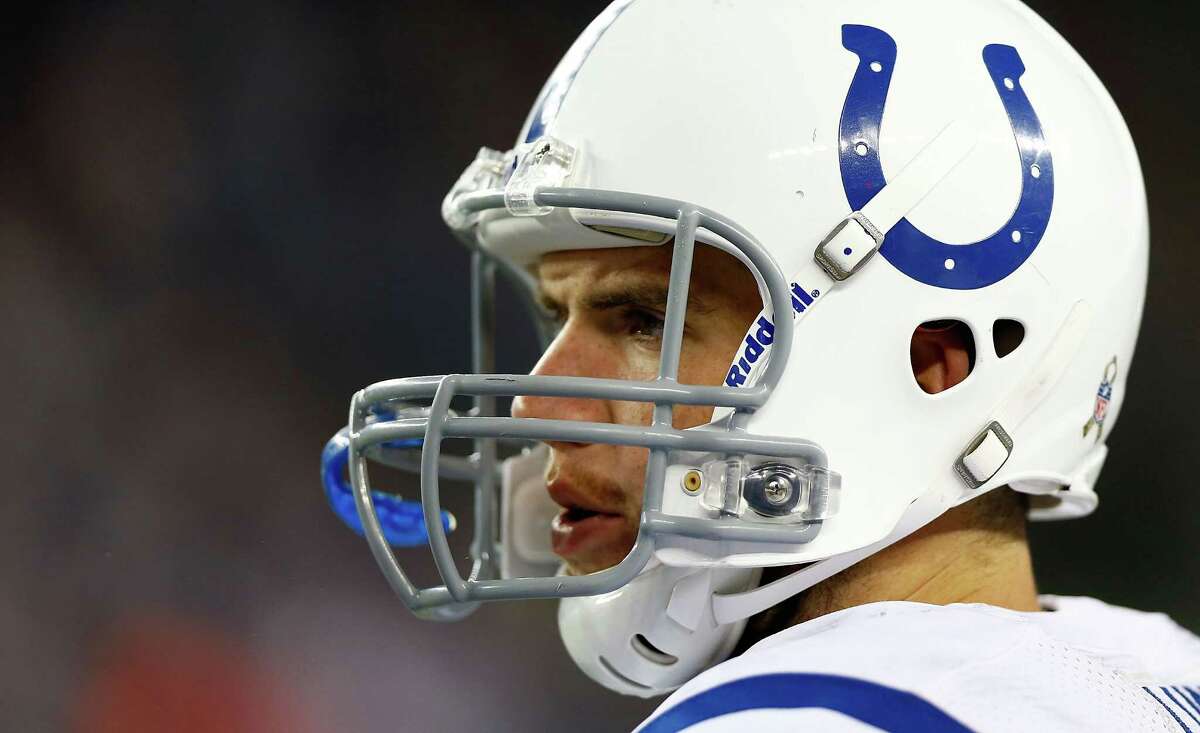 FOXBORO, MA - NOVEMBER 18: Andrew Luck #12 of the Indianapolis Colts watches his team play against the New England Patriots during the game on November 18, 2012 at Gillette Stadium in Foxboro, Massachusetts. (Photo by Jared Wickerham/Getty Images)