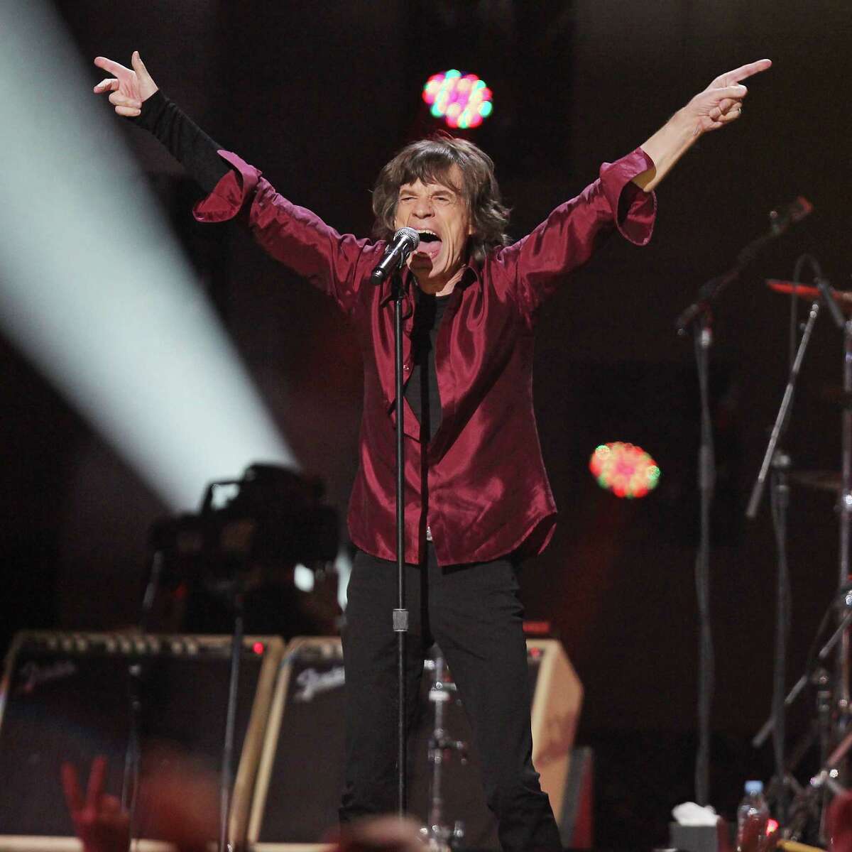 This image released by Starpix shows Mick Jagger of The Rolling Stones performing at the 12-12-12 The Concert for Sandy Relief at Madison Square Garden in New York on Wednesday, Dec. 12, 2012. Proceeds from the show will be distributed through the Robin Hood Foundation. (AP Photo/Starpix, Dave Allocca)