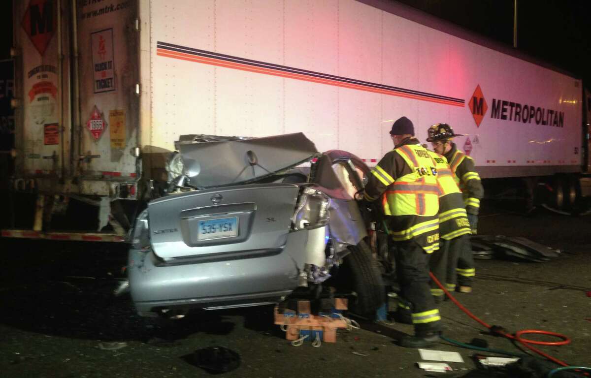 The driver of this Nissan Sentra was killed late Wednesday after colliding with a tractor-trailer truck late Wednesday at the southbound Interstate 95 rest stop in Fairfield. Fairfield CT 12/12/12
