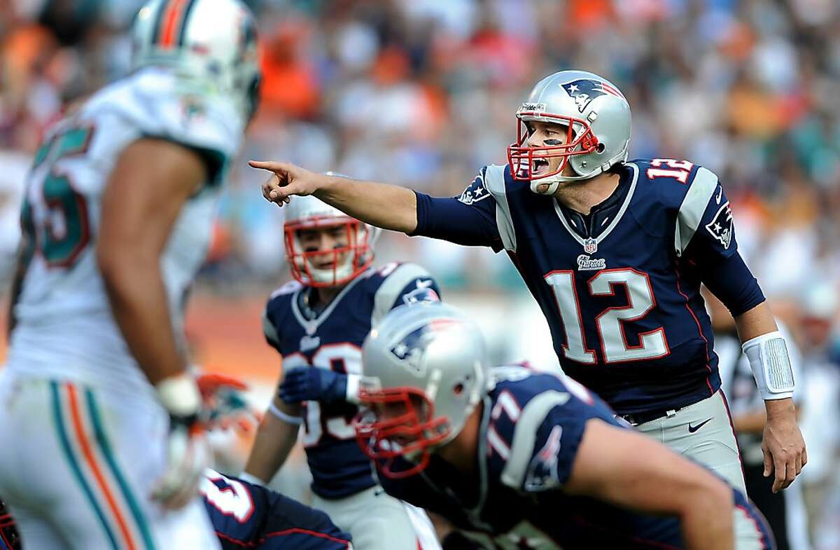 New England Patriots quarterback Tom Brady calls out an audible in the second quarter of an NFL game against the Miami Dolphins at Sun Life Stadium on Sunday, December 2, 2012, in Miami Gardens, Florida. The New England Patriots defeated the Miami Dolphins, 23-16. (Robert Duyos/Sun Sentinel/MCT)