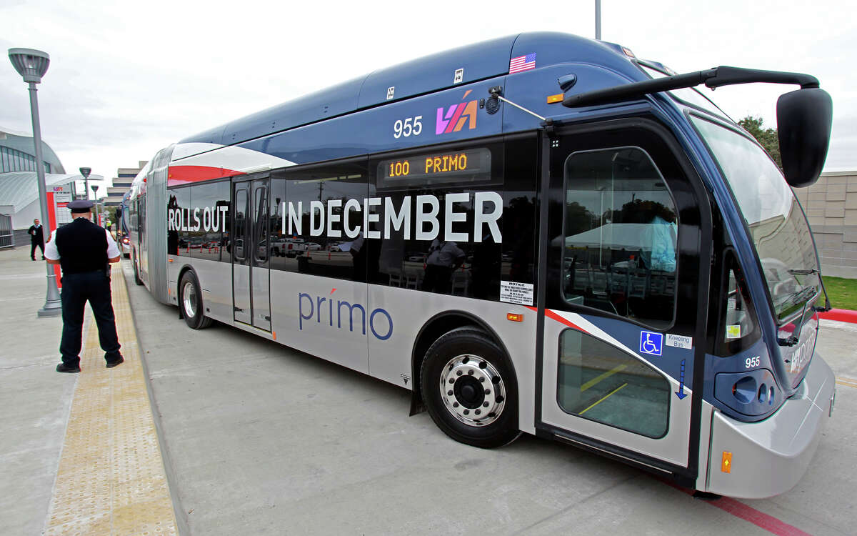 Leon Valley Mayor Chris Riley, along with other northwest area dignitaries, rides the new VIA Primo bus route that was demonstrated in December at the South Texas Medical Center.