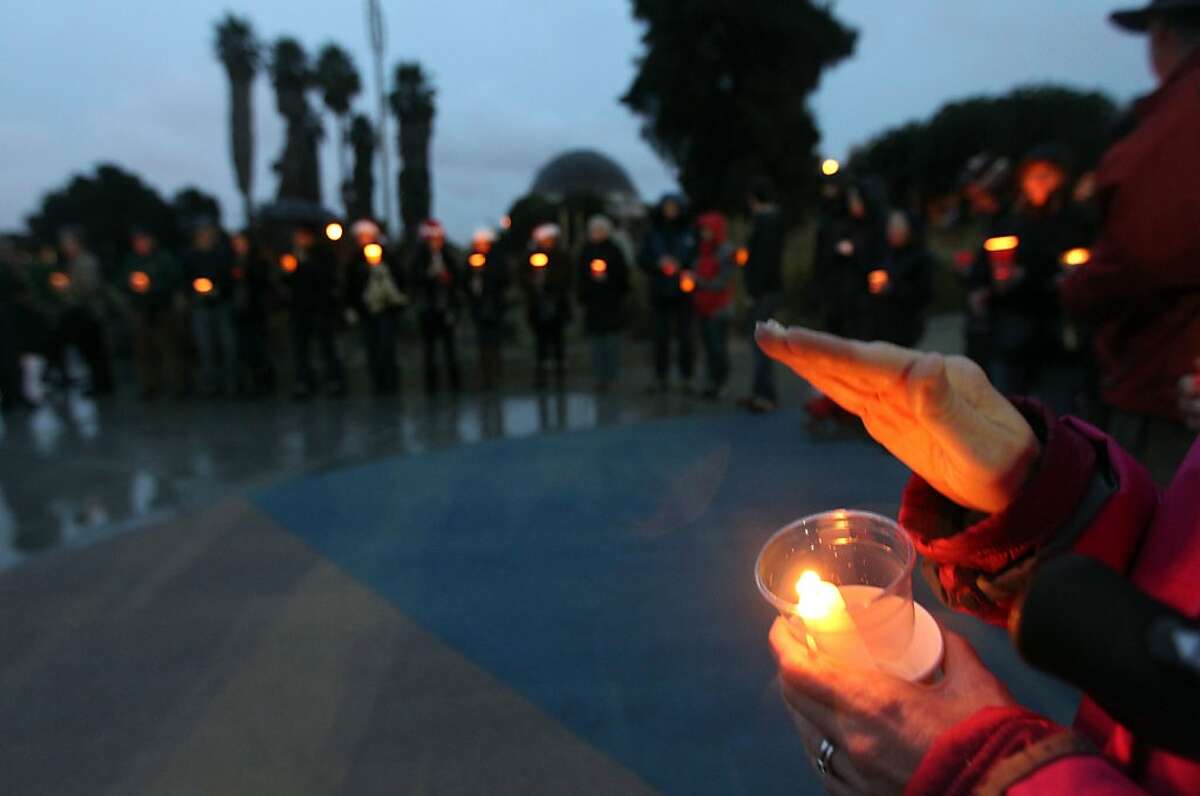 San Francisco residents attended a candlelight vigil to remember the Sandy Hook Elementary school shooting victims in Dolores Park, in San Francisco, Calif., Saturday, Dec. 15, 2012.