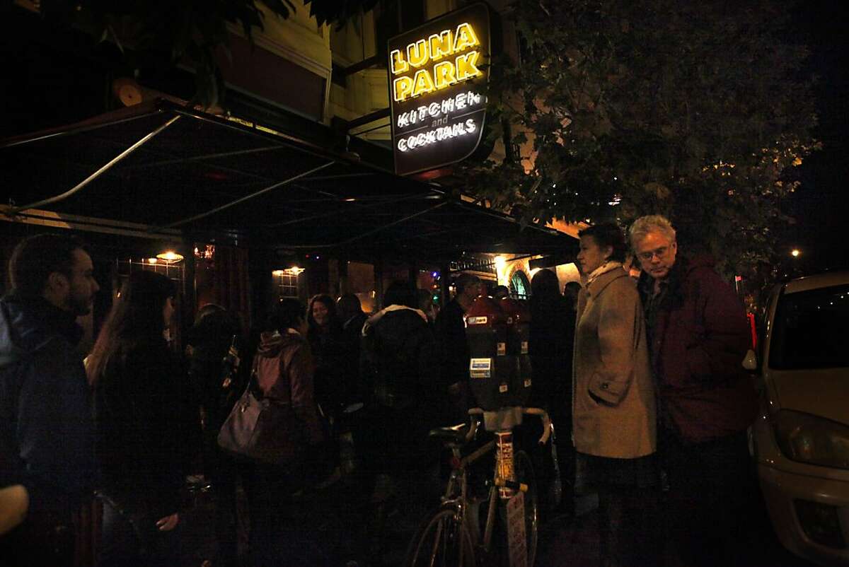 The sidewalk in front of Luna Park restaurant in San Francisco, California, during the dinner hour on Friday, December 14, 2012.