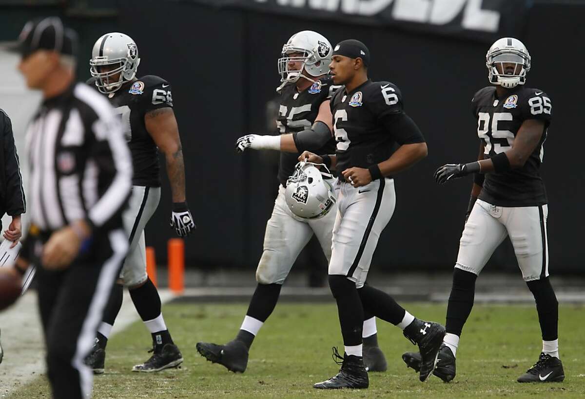 Terrell Pryor walks off the field in the second quarter after a short series of plays that failed to convert a first down. The Oakland Raiders played the Kansas City Chiefs at O.co Coliseum in Oakland, Calif., on Sunday, December 16, 2012. The Raiders defeated the Chiefs 15-0, shutting out an opponent for the first time in 10 years.