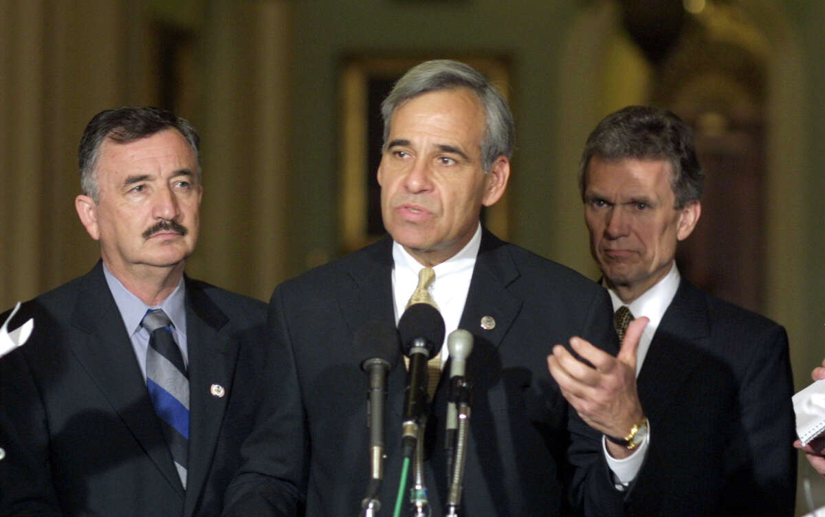 Congressional Hispanic Caucus Chairman Rep. Charlie Gonzalez, D-Texas, flanked by Rep. Ciro Rodriguez, D-Texas, left, and Senate Minority Leader Thomas Daschle, D-S.D., meets reporters on Capitol Hill Tuesday, Feb. 11, 2003, to discuss the nomination of Appeals Court Judge Miguel Estrada. President Bush appealed to the Senate Tuesday to stop talking and start voting on his nomination of Estrada to the federal appeals bench, but Senate Democrats said they had the votes to block an immediate confirmation vote. (AP Photo/Terry Ashe). Used as mug. HOUCHRON CAPTION (11/03/2004) SECSPECIAL: Gonzalez. SPECIAL SECTION: ELECTION 2004: CONGRESS.