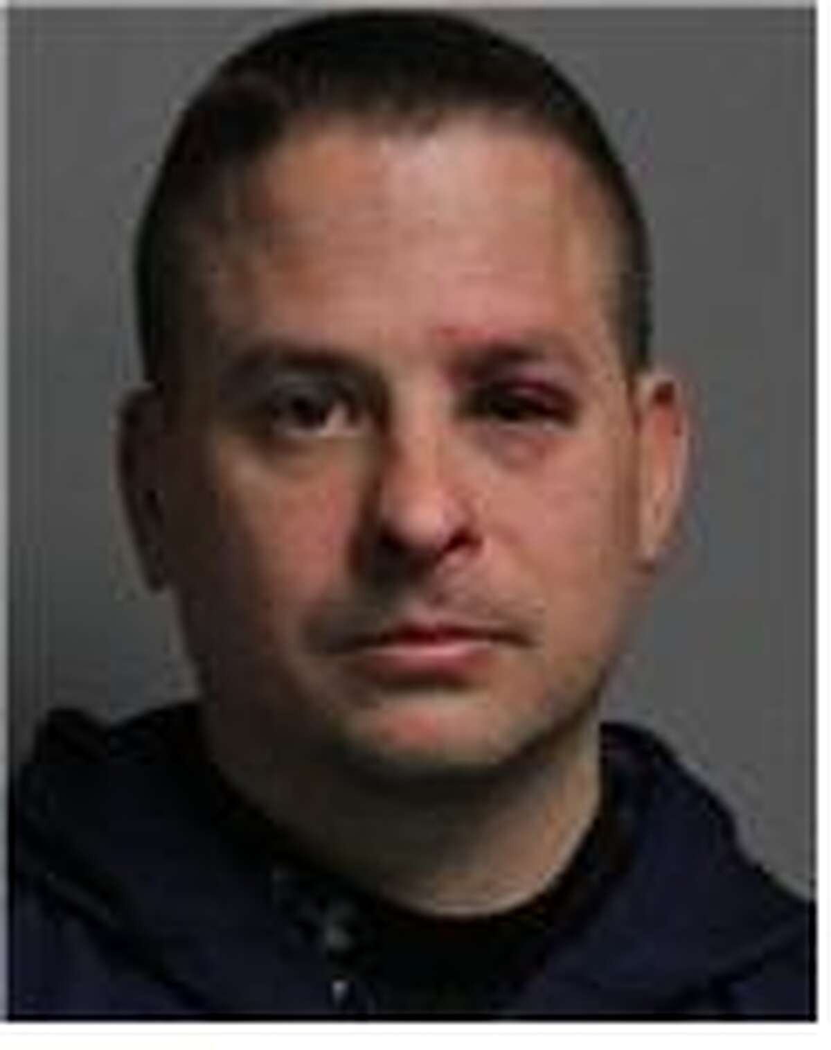 State Police Sgt. Gregory Bennett, 39, was charged with driving while intoxicated after he crashed his SUV on Interstate 90 early Sunday evening, Dec. 16, 2012, State Police said. He was driving his personal vehicle at 6:38 p.m. when he veered off the highway while driving westbound on the Exit 3 off ramp, troopers said. (STATE POLICE)