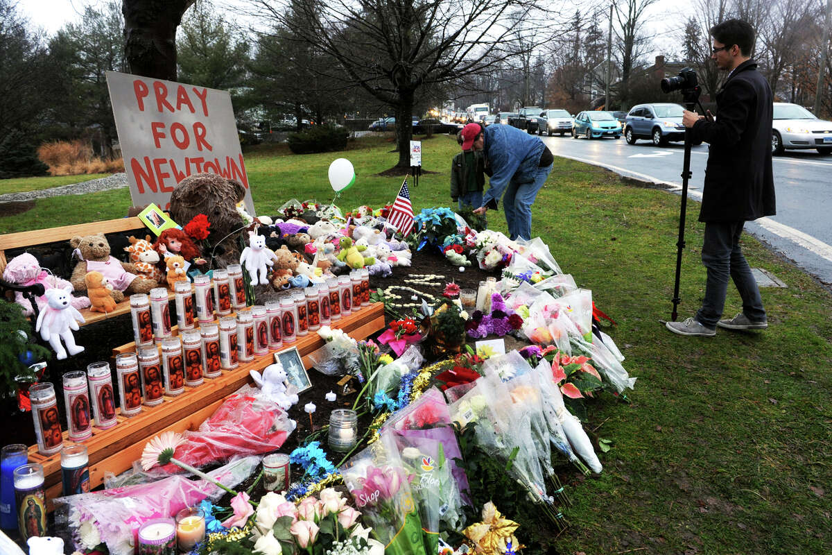 A memorial filled with flowers, candles and stuffed animals has been set up on The PLeasance, a town park on Main Street, in Newtown, Conn., Dec. 17th, 2012. Monday was the first day of funerals for victims of the Sandy Hook Elementary School shootings last Friday.