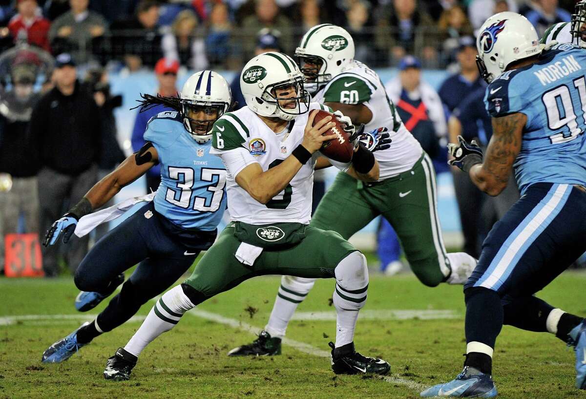 Wearing a New York Titans uniform, New York Jets quarterback Brett