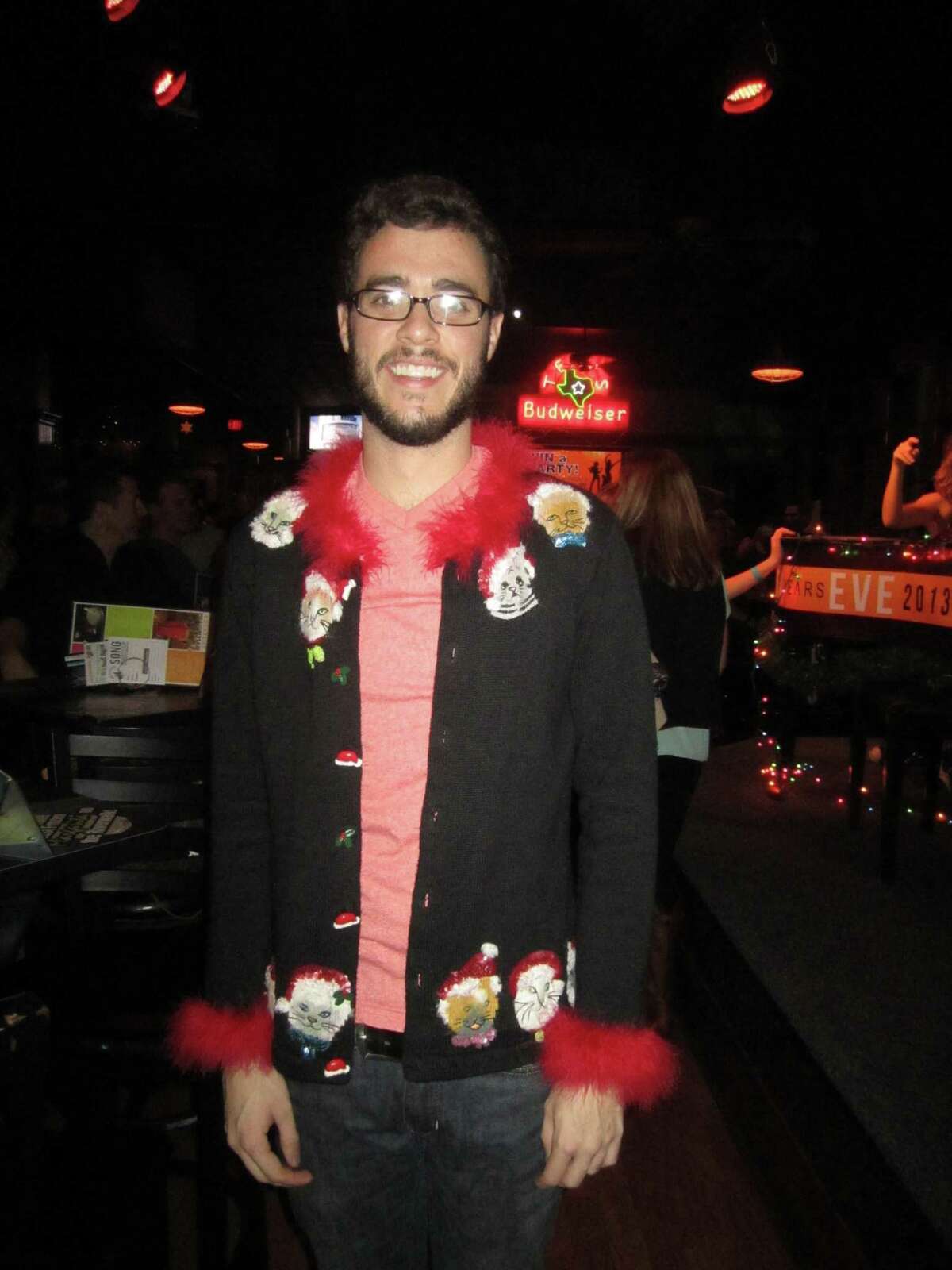 "Cheesy" sweater contest winner James Jarrott models his ugly sweater.
