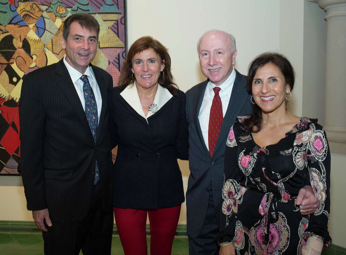Title sponsors with PlainsCapital Bank Mike and Janet Molak, from the left, McNay Art Museum director Bill Chiego and committee member Soonalyn Jacob get together at the McNay Art Museum's Holiday Brunch Home For The Holidays, benefiting the museum's Free Family Days program, Sunday, December 2, 2012.