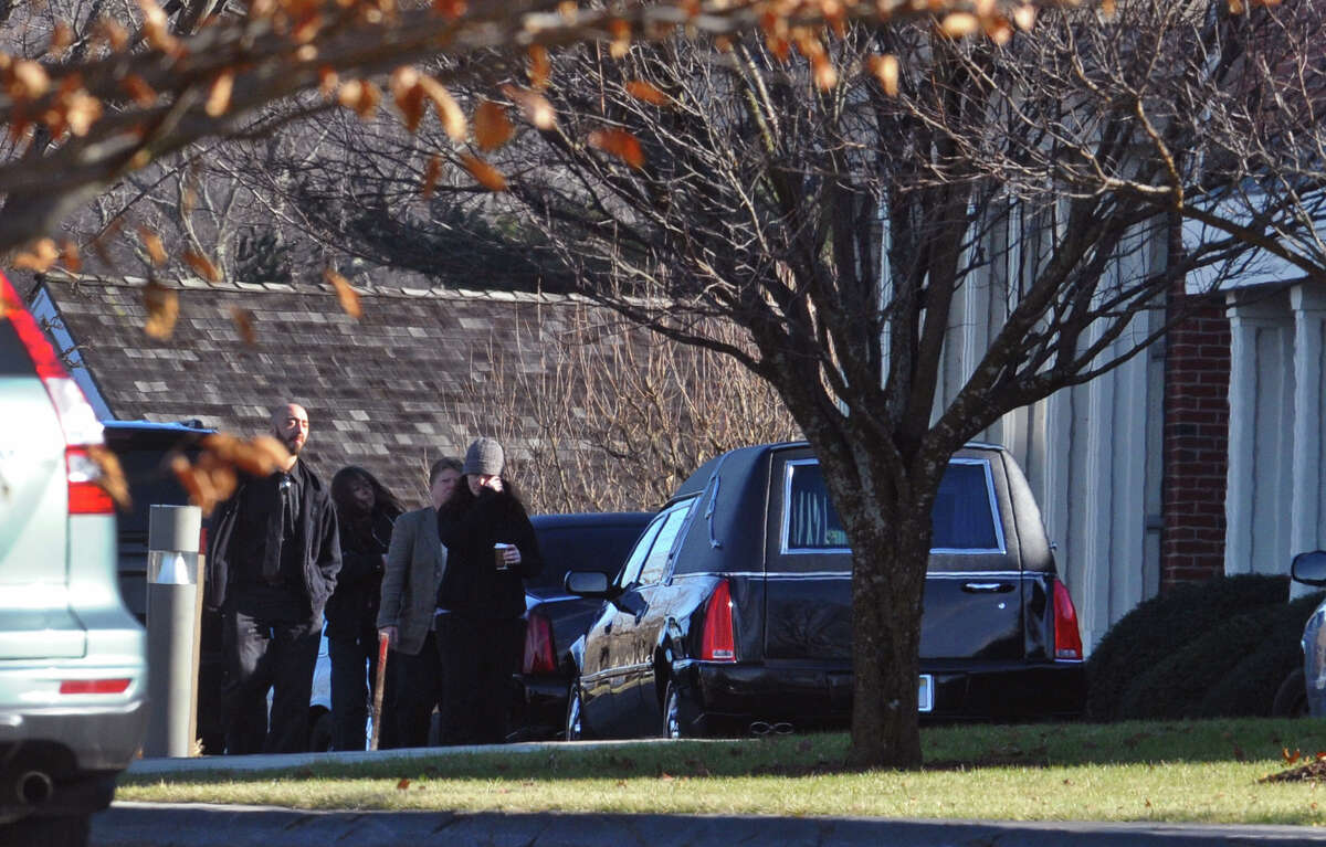Mourners arrive for the funeral for Sandy Hook Elementary School student Allison Wyatt which was held at Sacred Heart Roman Catholic Church in Southbury Conn. on Thursday December 20, 2012.