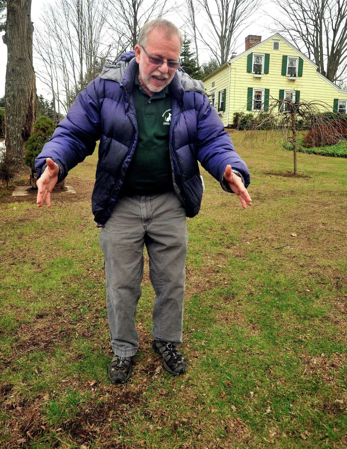 Gene Rosen stands in front of his Newtown home and shows the spot where he found six children from neighboring Sandy Hook Elementary School huddled on his lawn last Friday. Photographed Thursday, Dec. 20, 2012.