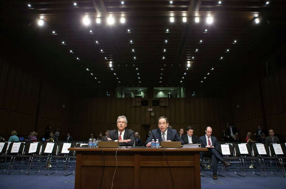 Deputy Secretary of State William Burns, left, who is in charge of policy, and Deputy Secretary of State Thomas Nides, right, who is in charge of management, appear before the Senate Foreign Relations Committee about the attack on the consulate in Benghazi, Libya, where the U.S. ambassador and three other Americans were killed on Sept. 11, on Capitol Hill in Washington, Thursday, Dec. 20, 2012. Secretary of State Hillary Rodham Clinton had been scheduled to testify but canceled after fainting and sustaining a concussion last week. (AP Photo/J. Scott Applewhite)