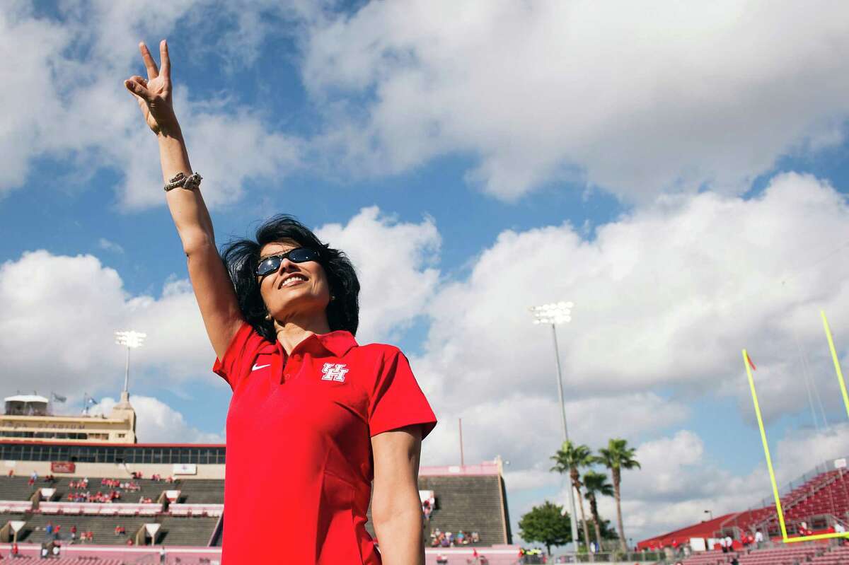 University of Houston Chancellor Renu Khator acknowledges the crowd before a football game in October. "Renu Khator is a rock star," the head of regents says.