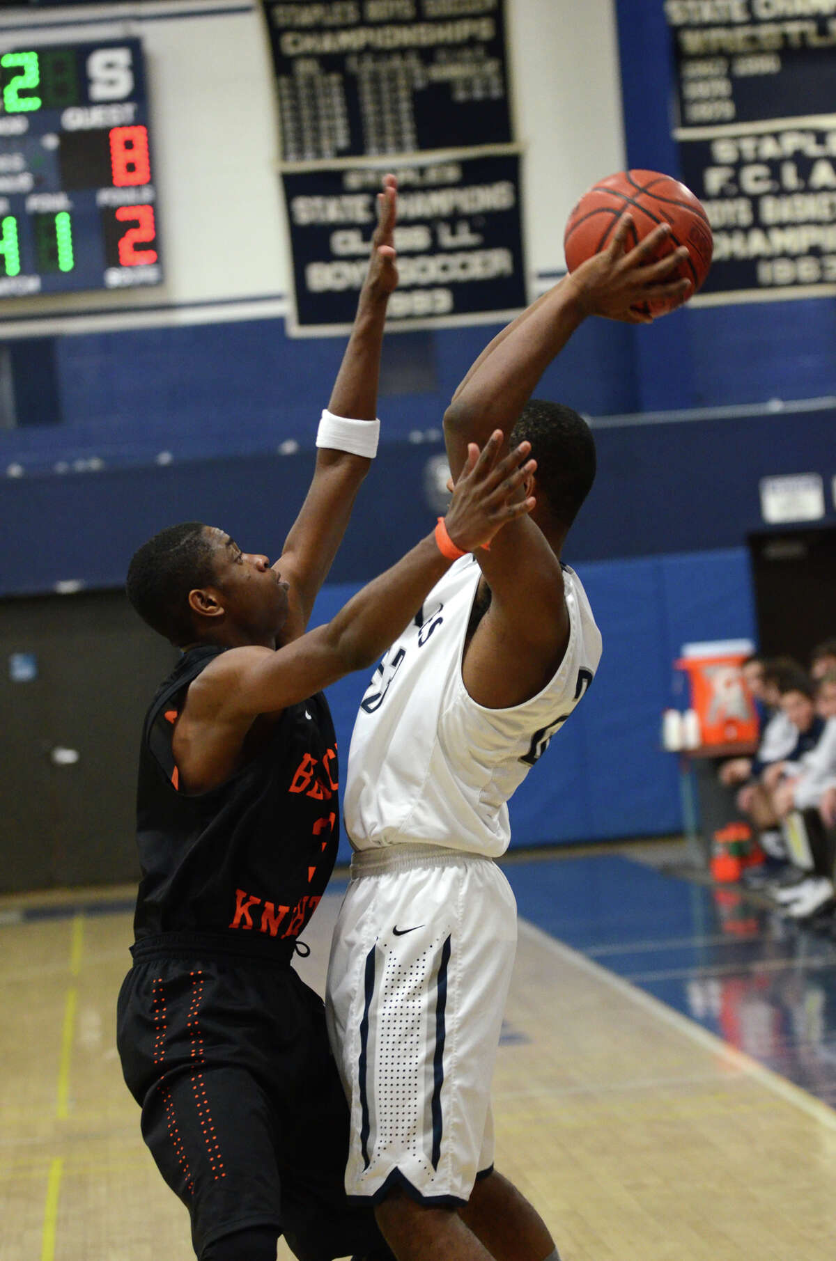 Staples boys basketball storms past Stamford