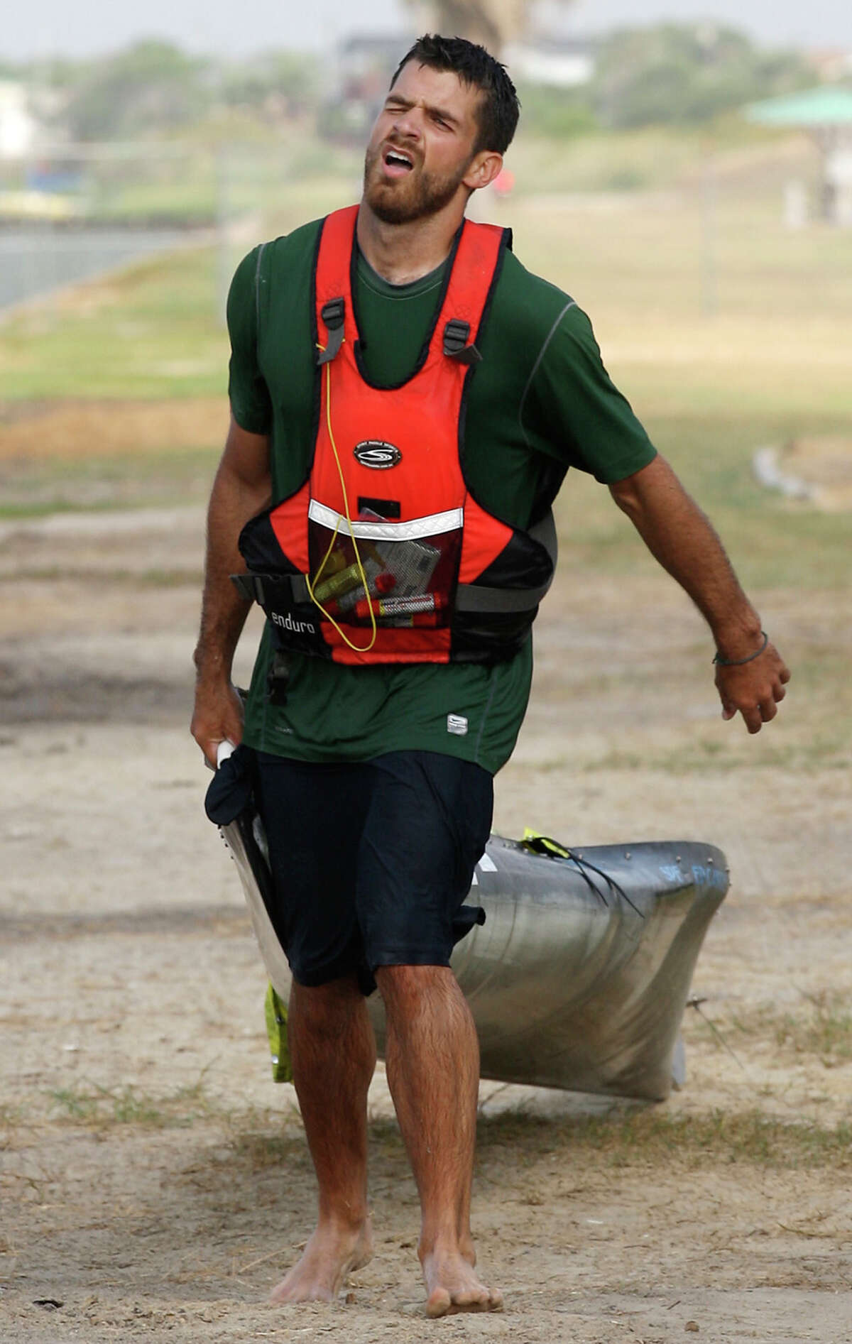 Andrew Condie drags his canoe the last quarter mile after getting out of the San Antonio Bay during the 2012 Texas Water Safari canoe race, Monday, June 11, 2012. Allowed by rules, Condie was able to finished in 12th place overall.