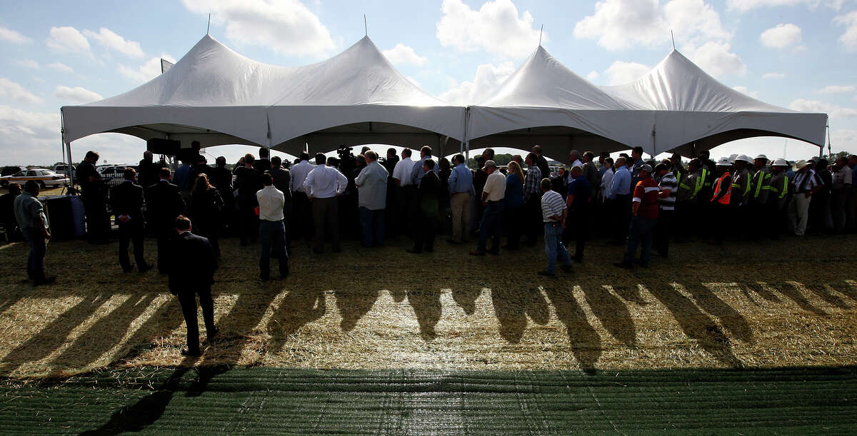 A crowd gathers at the opening of Texas State Highway 130 just west of Lockhart, Texas, Wednesday, Oct. 24, 2012. The toll road has the nation's fastest speed limit at 85-mph. It runs from IH-10 just east of Seguin, connects with Texas 45, a toll road that circumvents Austin and wind up at IH-35 just north of Georgetown. Click to browse all of the EN's most memorable photos of 2012