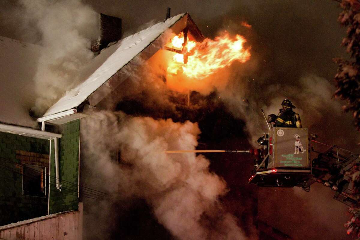 Firefighters battled a blaze at 247 Colorado Avenue, Saturday evening, Dec. 29, 2012, in Bridgeport, Conn.