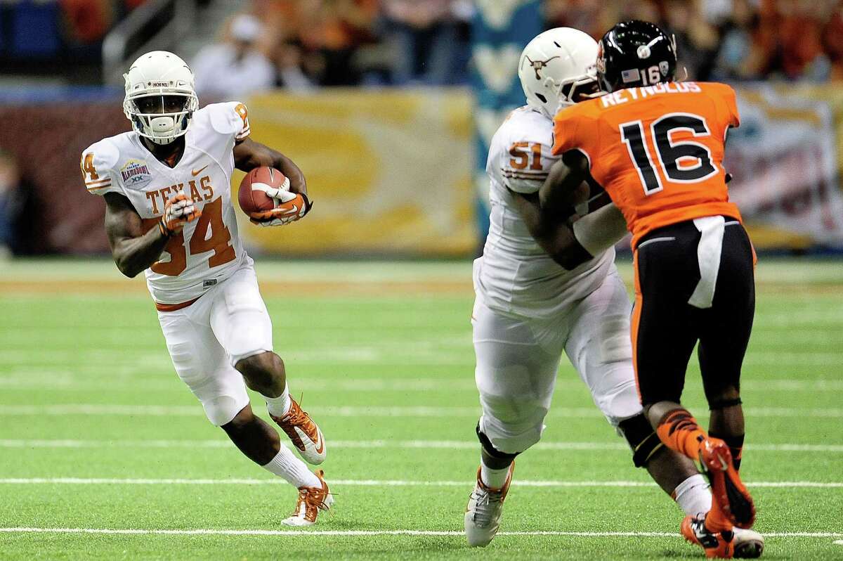 UT football to play in Valero Alamo Bowl - Austin Business Journal