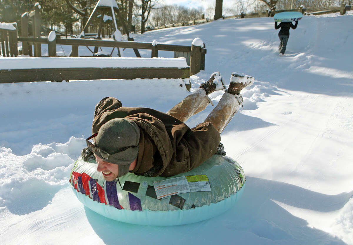 John Ogrodnick, of Ansonia, sleds at the Ansonia Nature Center on Sunday, December 30, 2012.