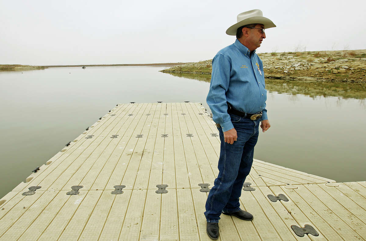 Zapata County Sheriff Sigifredo Gonzalez stands on a dock at Falcon Lake, where David Hartley was shot to death in 2010 while riding Jet Skis with his wife. Gonzalez, who is retiring after 18 years in office, defends his actions after the killing.