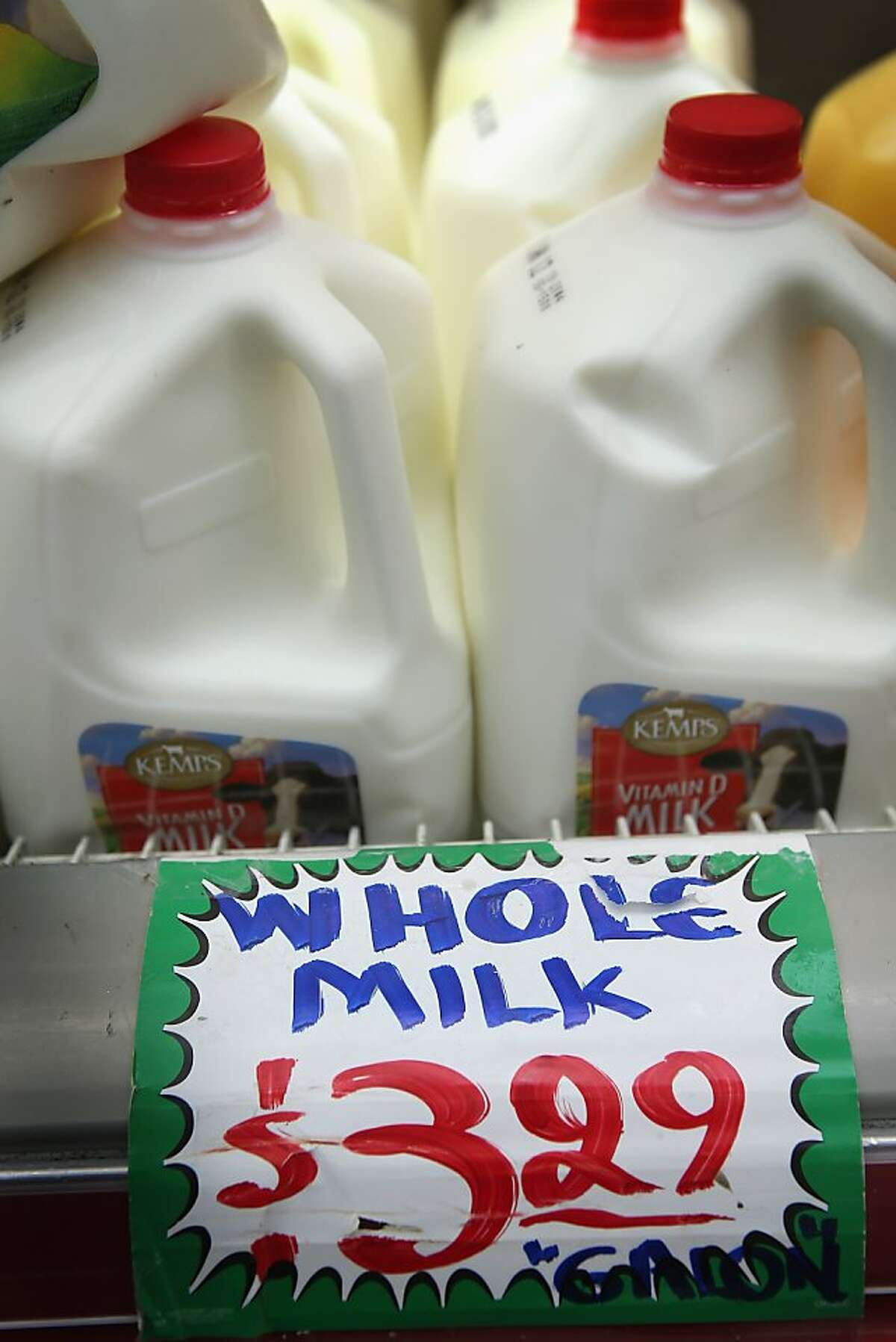 CHICAGO, IL - DECEMBER 27: Milk is offered for sale at a grocery store on December 27, 2012 in Chicago, Illinois. Milk prices could spike to $6 to $8 a gallon in January if lawmakers fail to reach a "fiscal cliff" deal and renew a Farm Bill that's been in place since 2008 and sets the price at which the government buys milk. (Photo by Scott Olson/Getty Images)