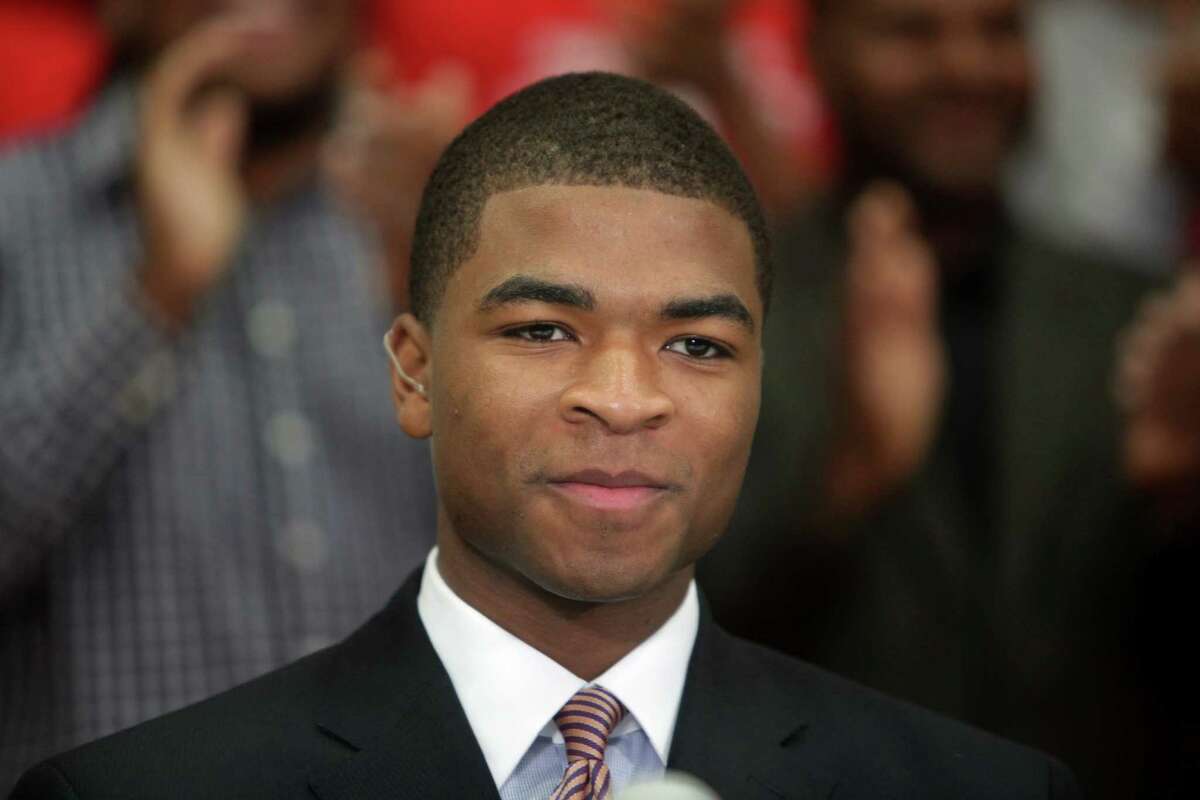 Aaron Harrison smiles before going live on ESPN2 to announce their pledge to Kentucky on Thursday, Oct. 4, 2012, in Richmond. The Harrison brothers are rated in the top 5 players in the country, and Aaron Harrison is ranked No.1. ( Mayra Beltran / Houston Chronicle )