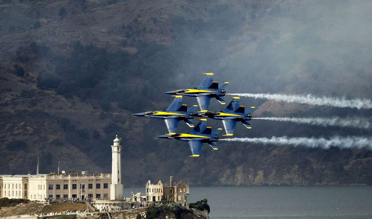 Four members of the Blue Angels pass in front of Alcatraz Island as pilots run through a final rehearsal in the skies above San Francisco, Calif., on Friday October 5, 2012, preparing for this weekend's air shows. Part of the many events happening during Fleet Week this weekend along San Francisco Bay.