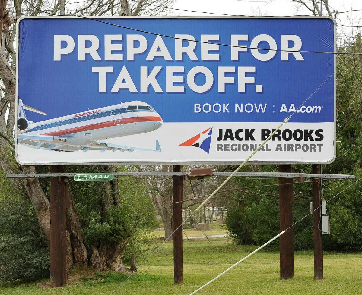 This billboard on the I-10 service road before the downtown eastbound exit gives drivers notice that the new Amerian Airlines service from Jack Brooks Regional Airport is available for booking now. Dave Ryan/The Enterprise