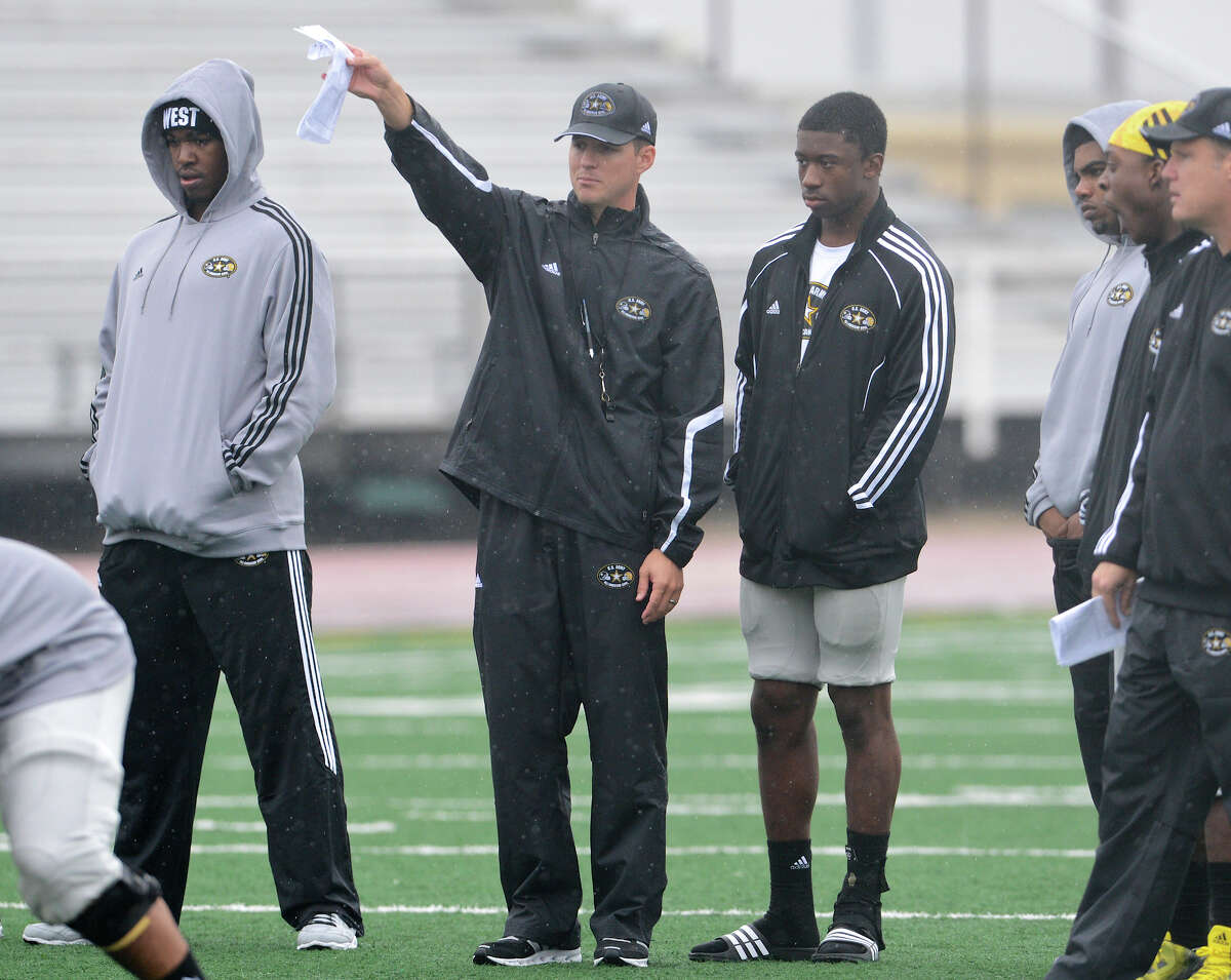 U.S. Army All-American Bowl West Team assistant coach Scott Lehnhoff directs players during a U.S. Army All-American Bowl West Team practice at Comalander Stadium, Monday, December 31, 2012. John Albright / Special to the Express-News.