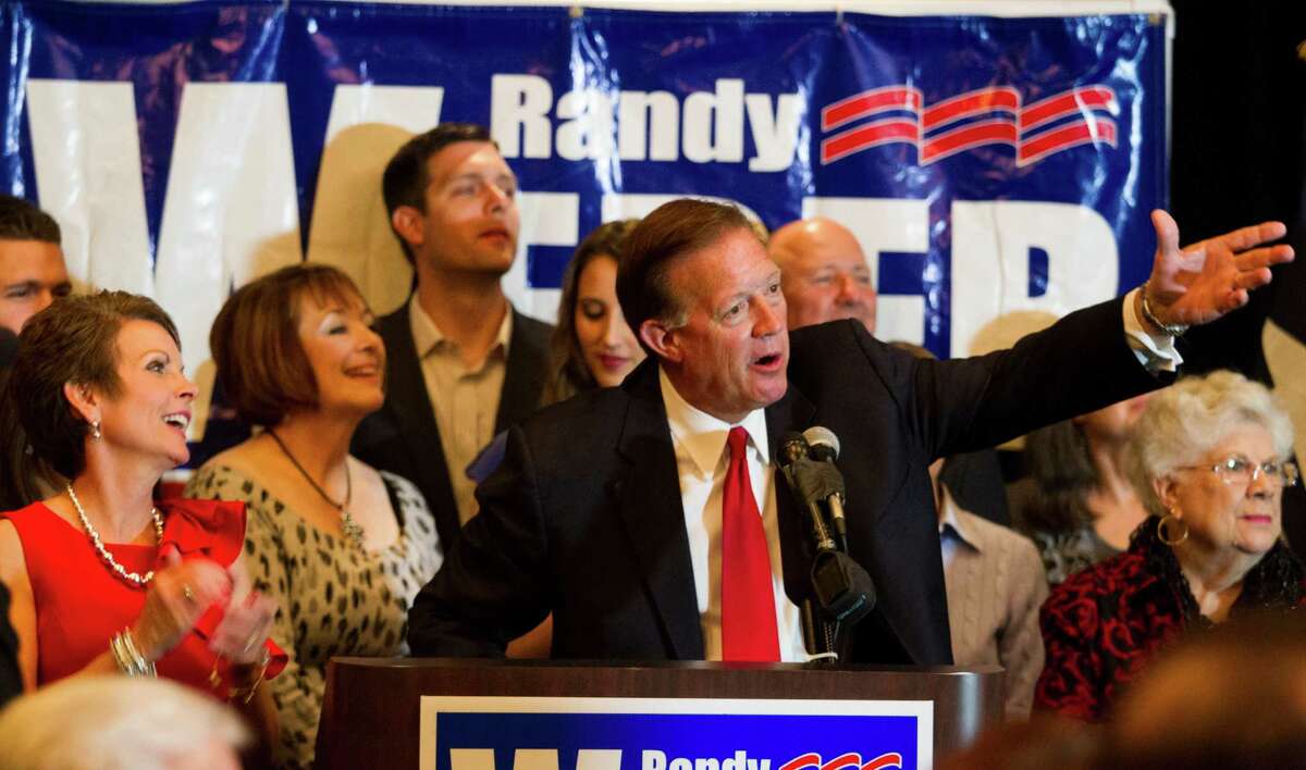 Newly-elected Republican candidate Randy Weber gives his victory speech as his wife Brenda, left, looks on at the South Shore Harbor Resort and Conference Center on Tuesday, Nov. 6, 2012, in League City, Texas. Weber defeated Democratic candidate Demoractic Nick Lampson for the 14th Congressional District. (AP Photo/Houston Chronicle, J. Patric Schneider) MANDATORY CREDIT