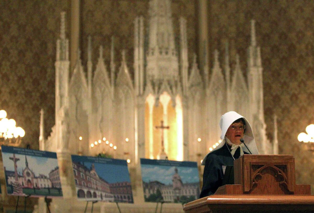 Sister Theresa Gossen (at lectern) tells some of the story of the Sisters of Divine Providence and the Missionary Catechists of Divine Providence and the 250th anniversary celebration of the groups. The celebration was held at Sacred Heart Conventual Chapel at Our Lady of the Lake University, Jan. 15, 2012) JOHN DAVENPORT/jdavenport@express-news.net