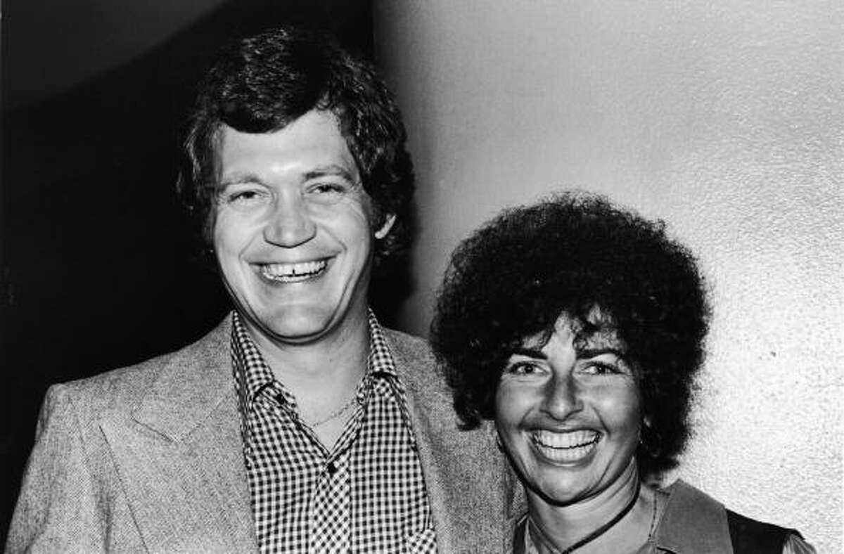 1979: American television host David Letterman poses with Carol Morra during a party at the Hollywood Palladium. Getty Images