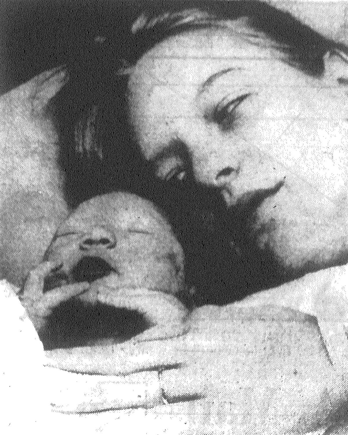The first baby of the New Year 1973, Michael A. Scott, sleeps close to his mom, Mrs. Keith Scott, at Wilford Hall Air Force Hospital. The eight pound, one ounce boy was born at 12:06 a.m. Published in the San Antonio Light Jan. 1, 1973.