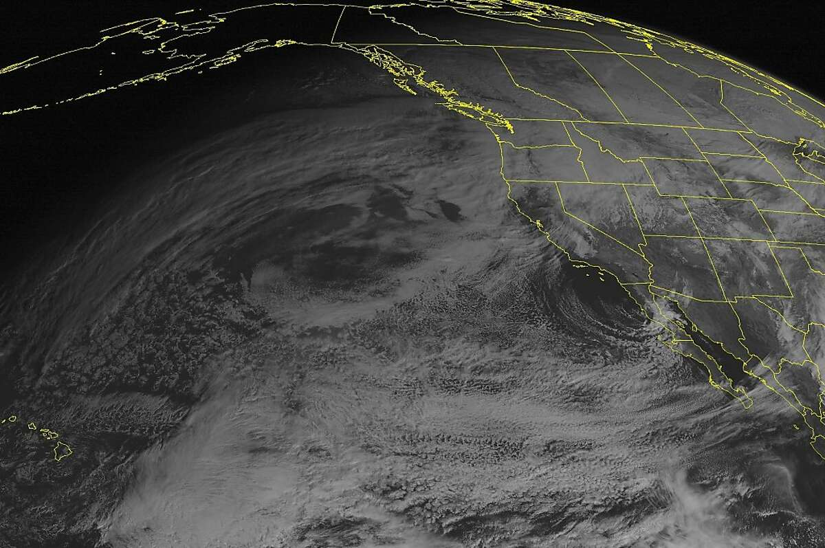 This NOAA satellite image taken Monday, January 07, 2013 at 02:00 PM EST shows fair weather across much of the western United States. Snow showers across eastern Washington and western Idaho. Light rain over coastal Washington. Strong low pressure over Gulf of Alaska with light to moderate snow.