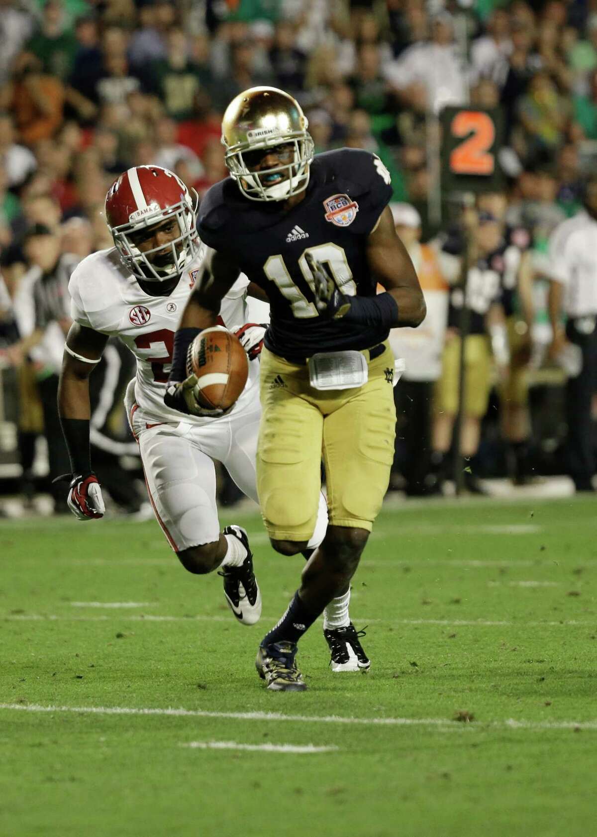 Notre Dame wide receiver DaVaris Daniels (10) makes a catch against Alabama during the second half of the BCS National Championship college football game Monday, Jan. 7, 2013, in Miami. (AP Photo/David J. Phillip)