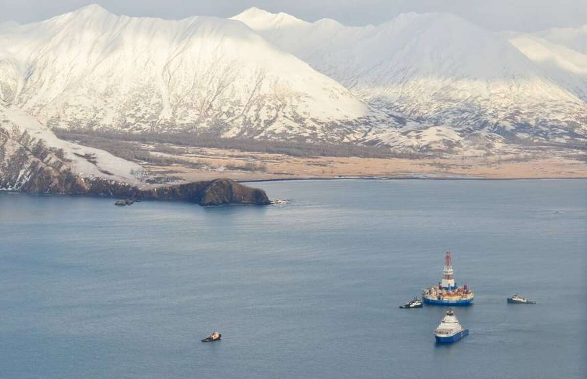 Vessels tow Shell s Kulluk drilling rig on Monday, Jan. 7, 2013 after freeing it from Alaska s Sitkalidak Island,
