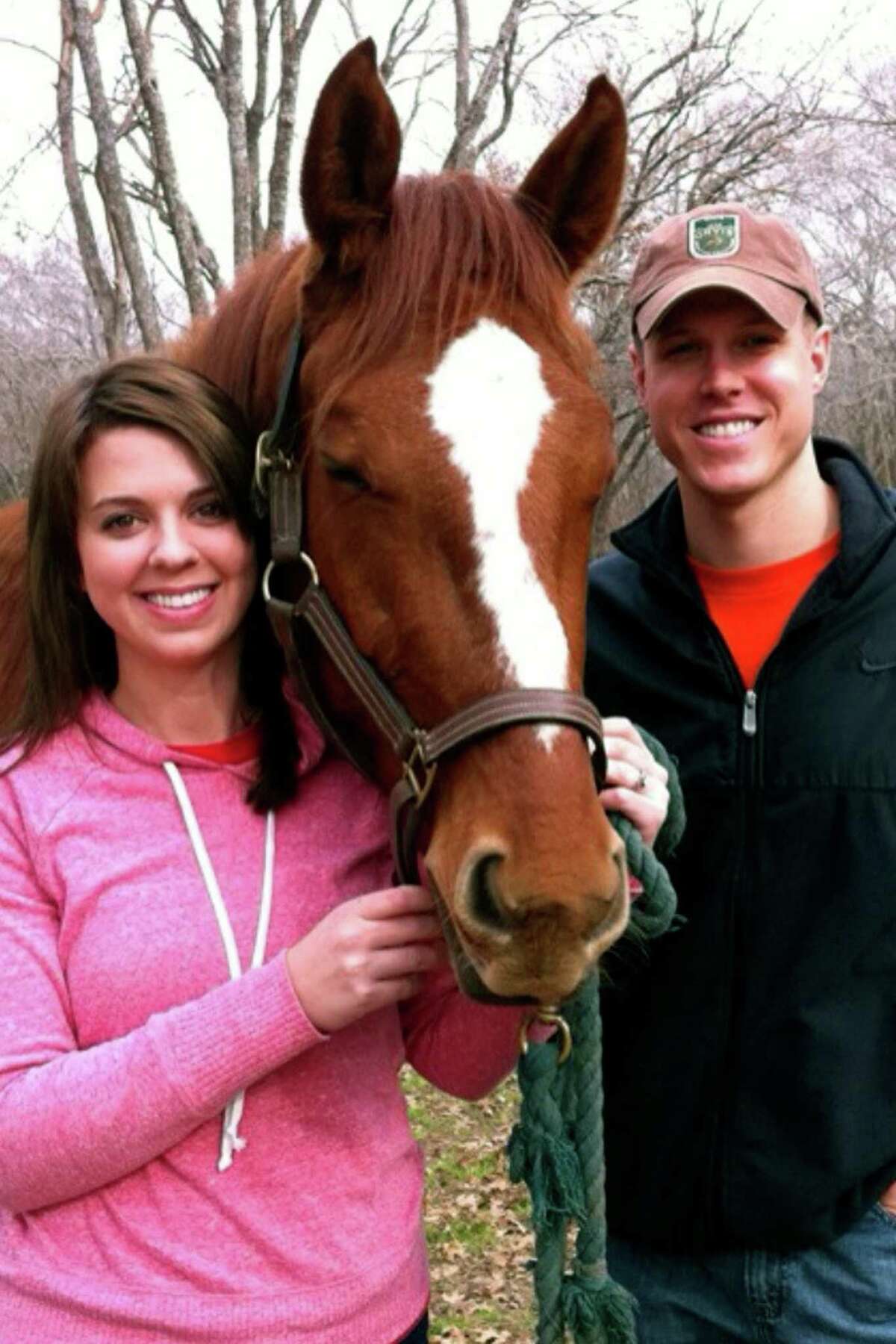 Rebecca and Ian Morrison with the horse he bought after thinking of his wife’s love of the animals. “He was really quiet except when he was around me,” Rebecca said of her husband.