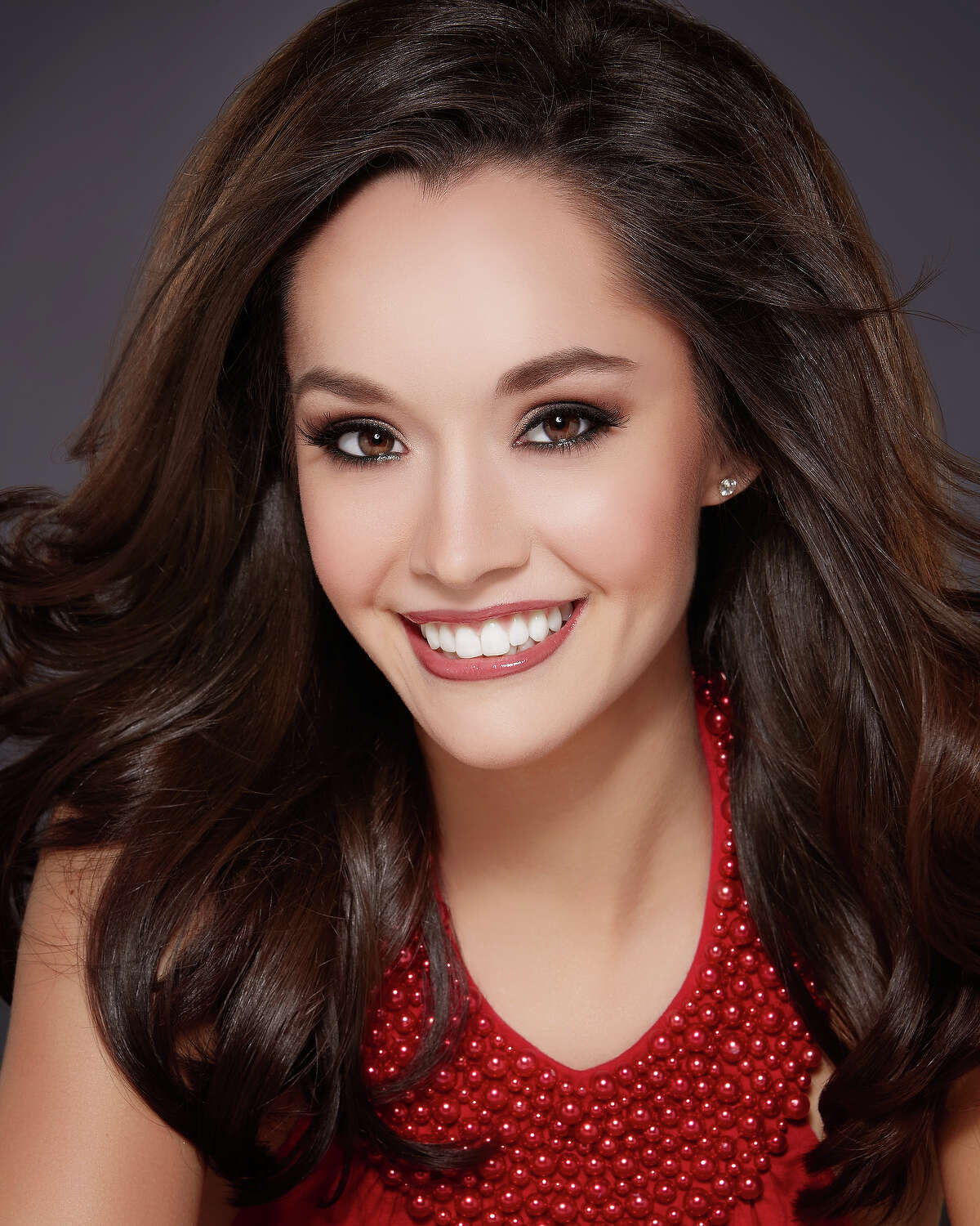 Miss Texas' first pitch off target at Rangers game