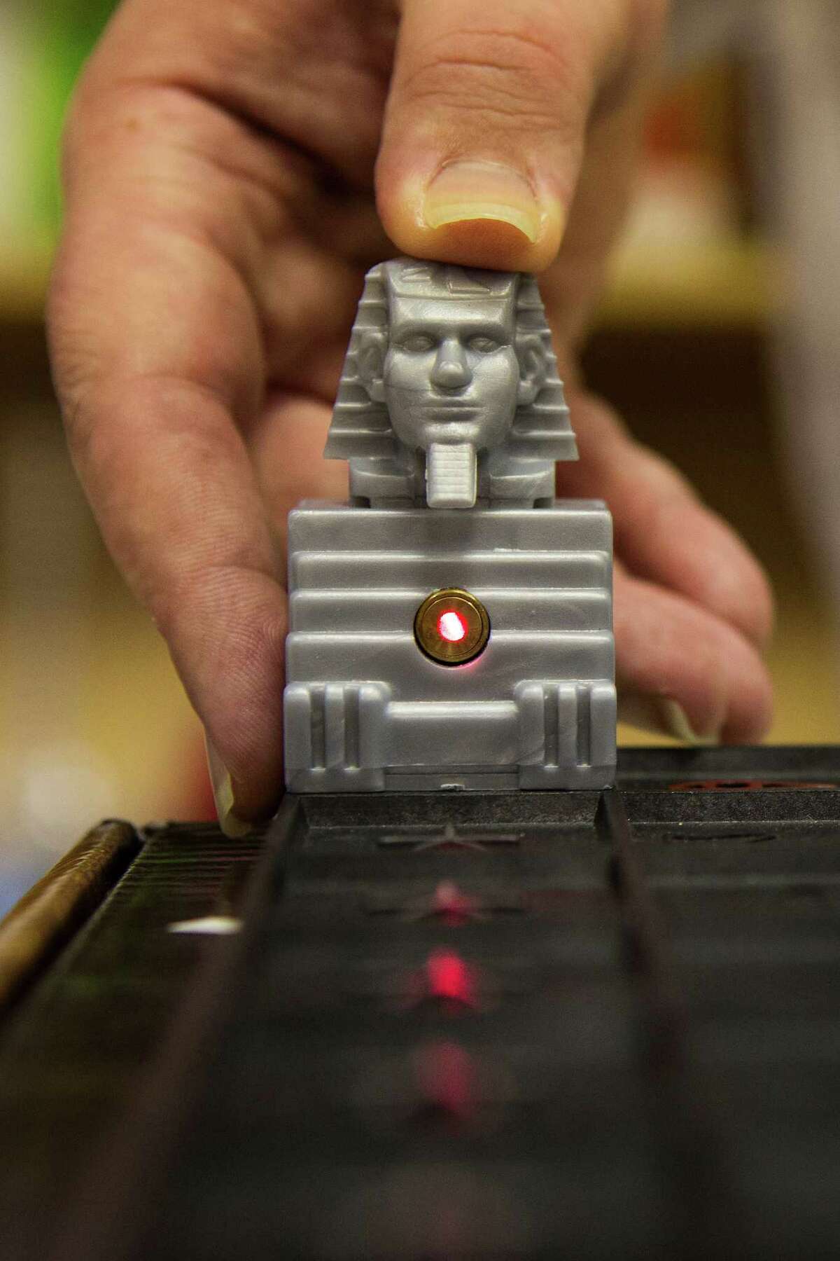 Enthusiasts light up around Egyptianthemed laser game