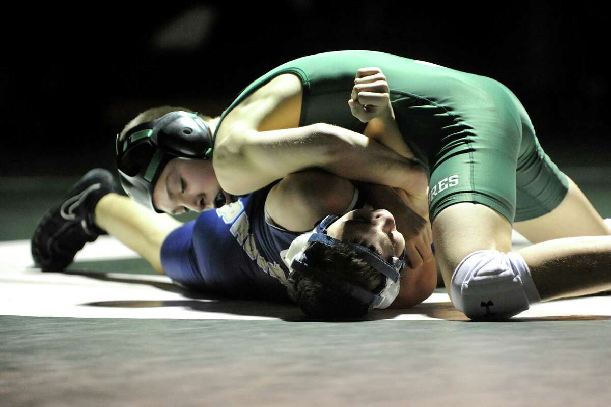Schalmont's Kyle Jasenski, top, grapples with Cohoes' C.J. Warner at 106 pounds during their wrestling match on Thursday, Jan. 3, 2013, at Schalmont High in Rotterdam, N.Y. (Cindy Schultz / Times Union)
