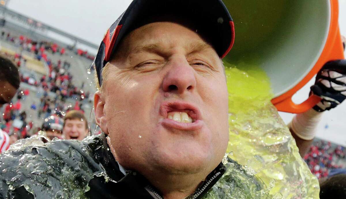 Mississippi head coach Hugh Freeze gets dunked at the end of the BBVA Compass Bowl NCAA college football game against Pittsburgh at Legion Field in Birmingham, Saturday, Jan. 5, 2013. Mississippi won 38-17.