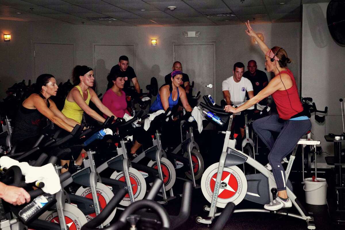 JoyRide Cycling Studio co-owner and lead instructor Rhodie Lorenz leads a fundraising ride on October 27, 2012 at the studioâÄôs Westport, Conn. location, benefiting the Westport Fire Department's efforts to raise money for lung disease research. Lorenz and her co-owners, Amy Hochhauser and Debbie Katz, are planning to open a Darien, Conn. studio in June, 2013.