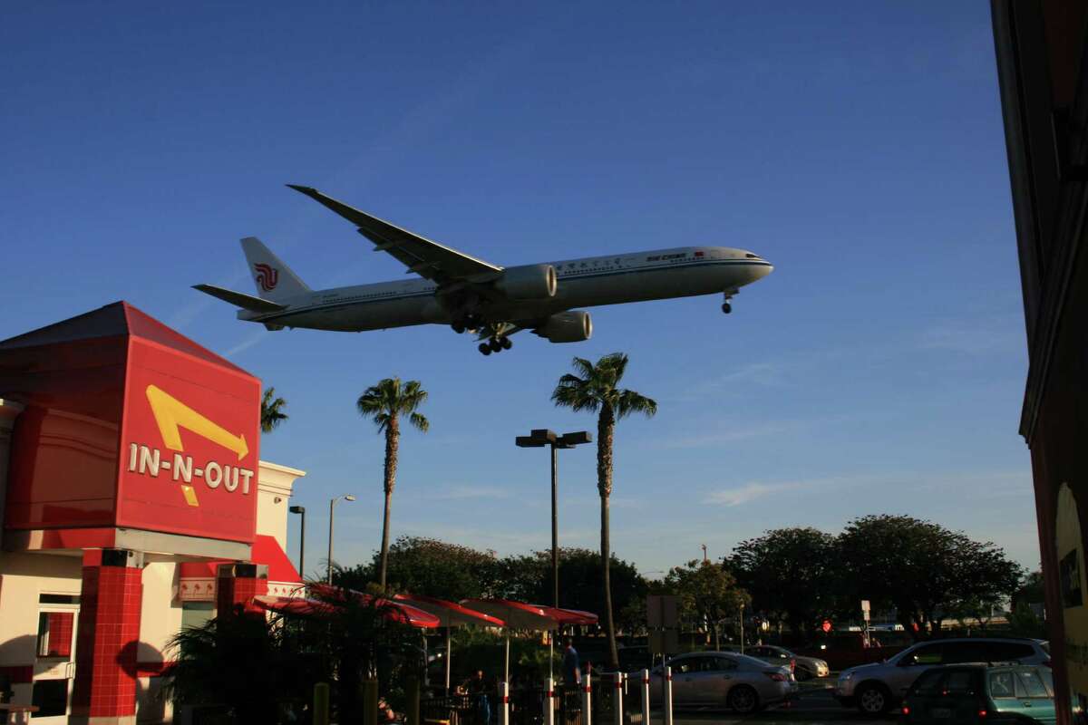 An Air China Boeing 777 descends to Los Angeles International Airport in March 2012.
