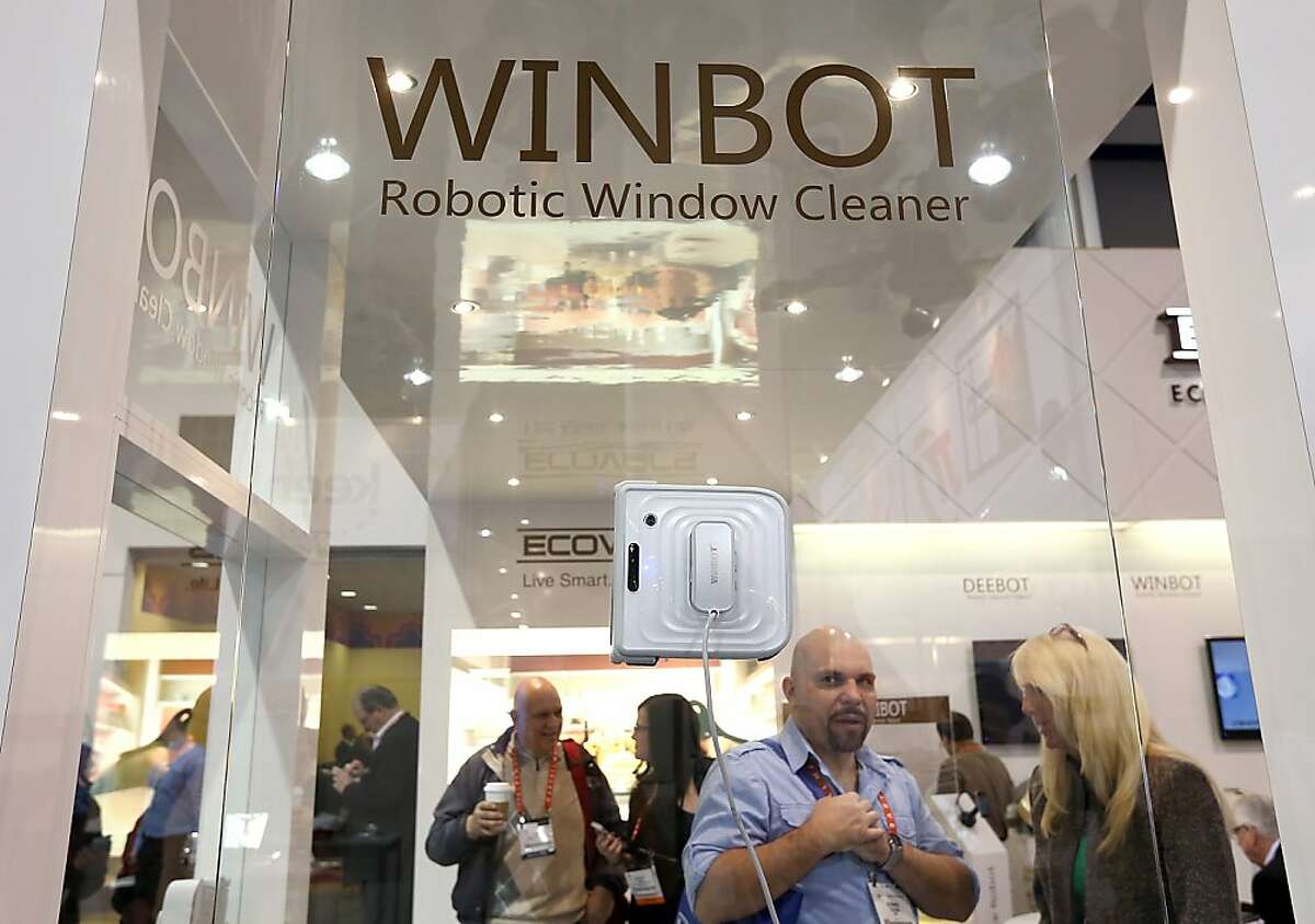 LAS VEGAS, NV - JANUARY 09: The Winbot robotic window cleaner is displayed during the 2013 International CES at the Las Vegas Hilton on January 9, 2013 in Las Vegas, Nevada. CES, the world's largest annual consumer technology trade show, runs through January 11 and is expected to feature 3,200 exhibitors showing off their latest products and services to about 150,000 attendees. (Photo by Justin Sullivan/Getty Images)