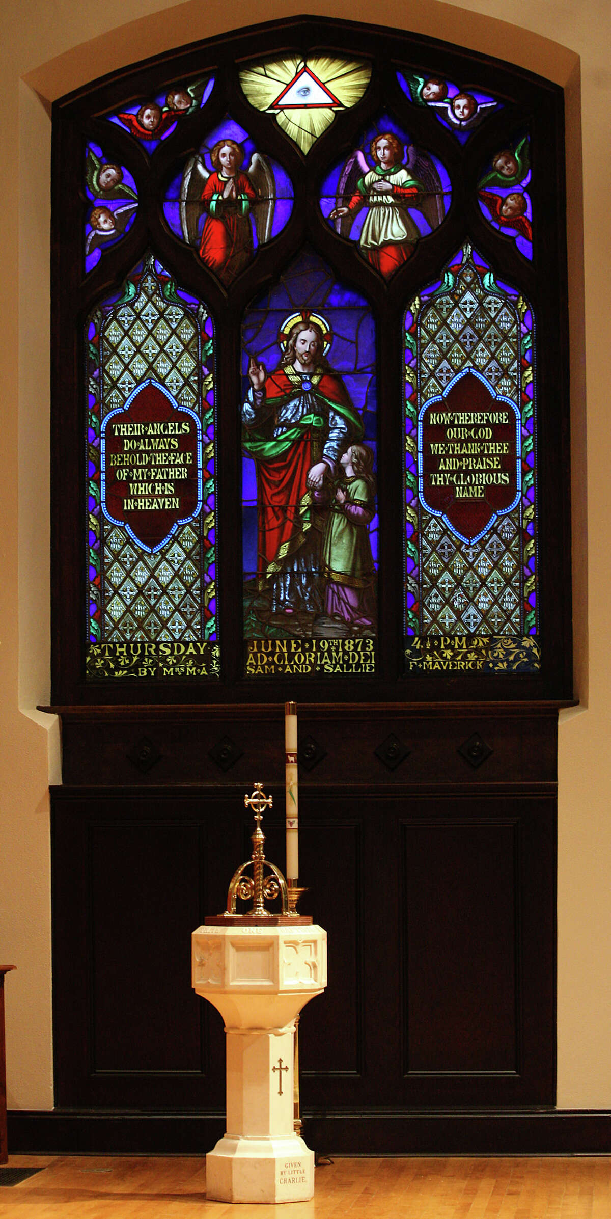 A detail of the baptismal font and stained glass at St. Mark's Church, Wednesday, Jan. 9, 2013. The church under went a $15 million renovation and will hold it's formal celebration on February 3.